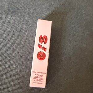 One Size turn up the base Butter Silk Concealer. Shade medium dark 3